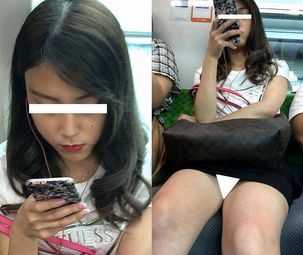 (電車対面）(顔出し)クールビューティーなロングヘア女子大生さん…黒のミニタイトからむき出しのふとももを観察してみました!!